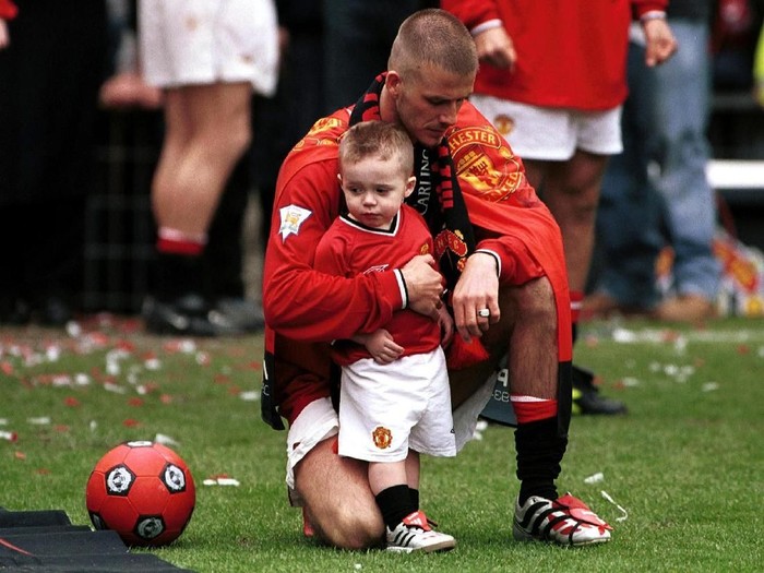 5 May 2001: David Beckham with Brooklyn aftre the FA Carling Premiership match between Manchester United and Derby County at Old Trafford, Manchester. Mandatory Credit: Stu Forster/ALLSPORT