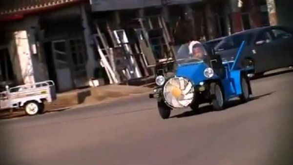 Foto: Petani Asal China Ini Berhasil Ciptakan Mobil Tenaga Angin