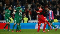 Dengan hasil 2-1 untuk kemenangan Leganes di Bernabeu, agregat kedua tim menjadi imbang 2-2. Namun Leganes berhak lolos berkat aturan gol tandang. Foto: Juan Medina/Reuters