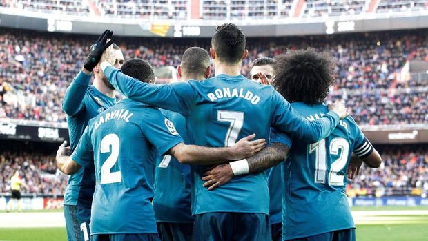 Cristiano Ronaldo memborong dua gol keunggulan Real Madrid lewat titik putih.