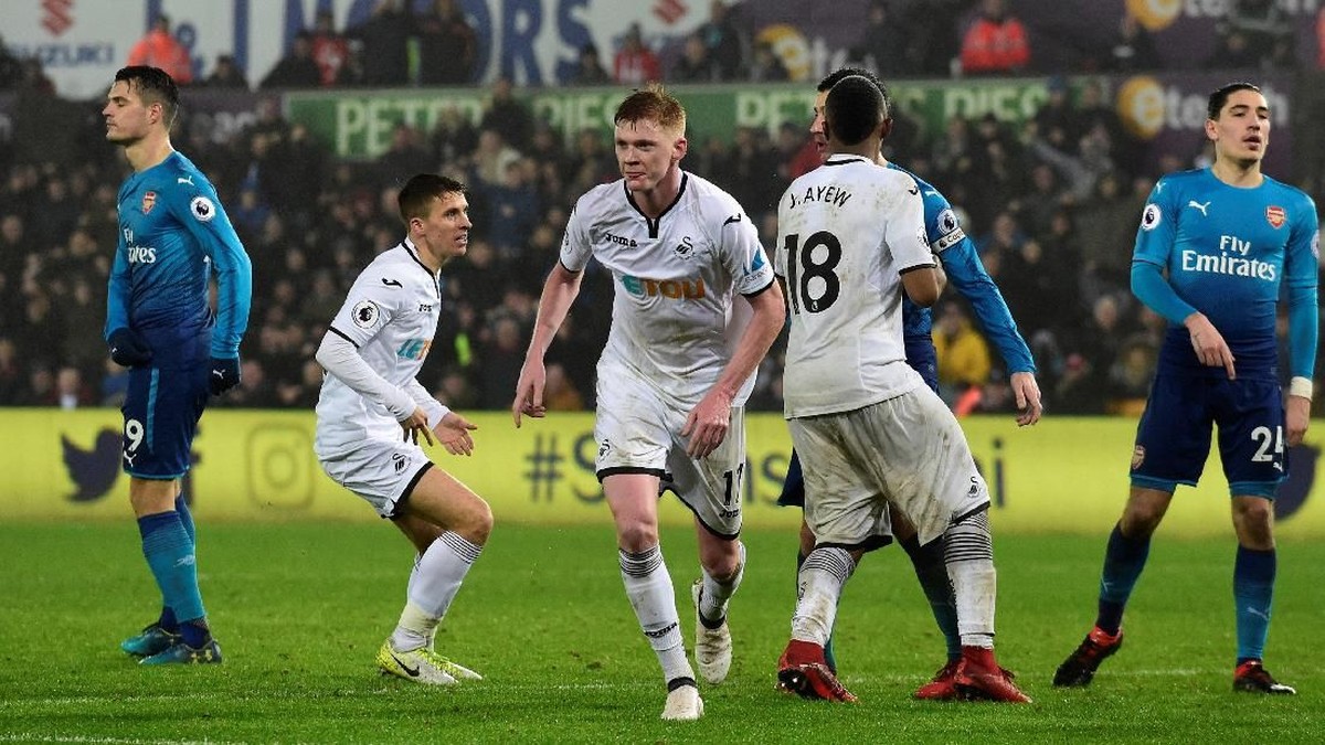 Arsenal kalah 1-3 di kandang Swansea City (Foto: Rebecca Naden/Reuters)