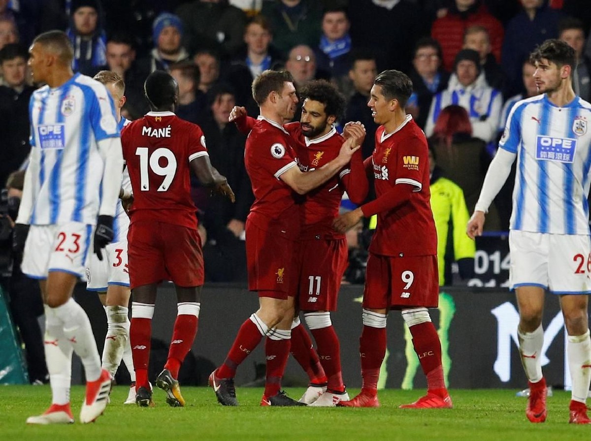 Pemain Liverpool merayakan gol ke gawang Huddersfield Town. (Foto: Phil Noble/Reuters)
