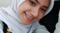 Foto: Manisnya Satpam Berhijab yang Pernah Jadi Model Ini