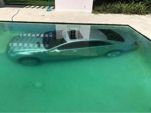 Putus Cinta, Wanita Ini Tenggelamkan Mobil Pacarnya