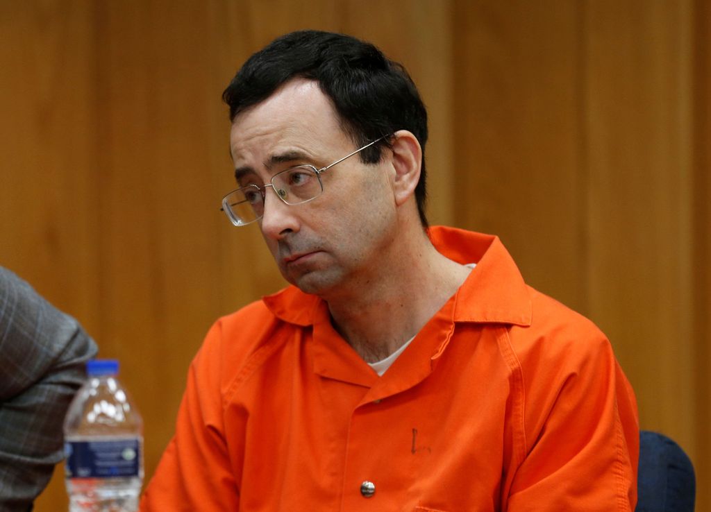 Larry Nassar, a former team USA Gymnastics doctor who pleaded guilty in November 2017 to sexual assault charges, sits in the courtroom during his sentencing hearing in the Eaton County Court in Charlotte, Michigan, U.S., February 2, 2018.   REUTERS/Rebecca Cook