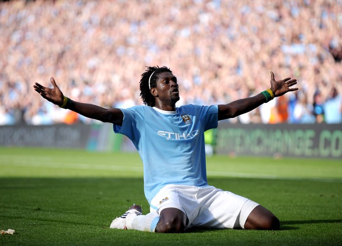 MANCHESTER, ENGLAND - SEPTEMBER 12: Emmanuel Adebayor of Manchester City celebrates in front of the Arsenal fans after scoring during the Barclays Premier League match between Manchester City and Arsenal at the City of Manchester Stadium on September 12, 2009 in Manchester, England. (Photo by Shaun Botterill/Getty Images)