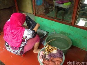 Banjir di Kampung Arus Cawang Surut, Warga Kembali Beraktivitas Banjir di Kampung Arus Cawang Surut, Warga Kembali Beraktivitas