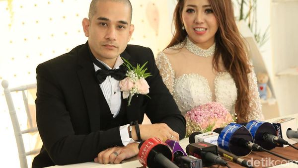Okan Cornelius dan May Lee Resmi Menikah