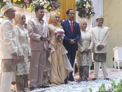 Foto: Jokowi Kondangan Pernikahan Anak Pelatih Panahnya