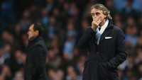 4. Roberto Mancini. Sejauh ini Manchester City menjadi satu-satunya klub Premier League yang pernah dibesut oleh Mancini. Kemenangan ke-50 di ajang itu dicatatkannya setelah 83 pertandingan. (Foto: Alex Livesey/Getty Images)