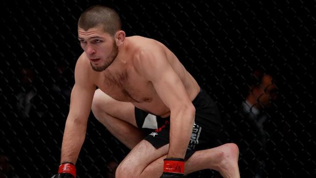 NEW YORK, NY - NOVEMBER 12: Khabib Nurmagomedov of Russia reacts against Michael Johnson of the United States in their lightweight bout during the UFC 205 event at Madison Square Garden on November 12, 2016 in New York City. Michael Reaves/Getty Images /AFP