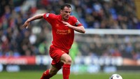 Jamie Carragher cuma bermain untuk Liverpool sepanjang kariernya. Dia pensiun pada 2013 dan kini sibuk sebagai komentator. (Foto: Warren Little/Getty Images)
