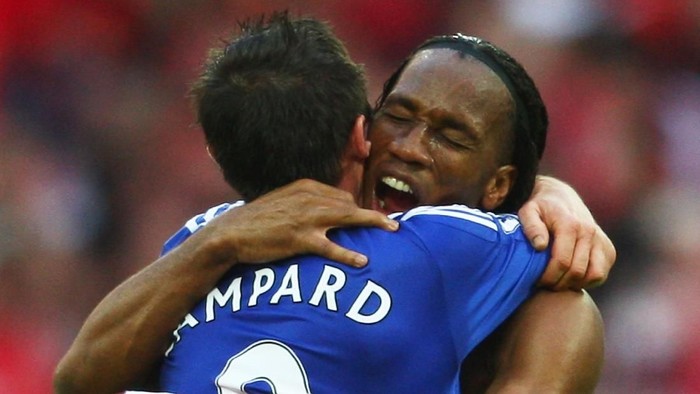 LONDON - APRIL 18: Didier Drogba and Frank Lampard of Chelsea celebrate victory after the FA Cup sponsored by E.ON Semi Final match between Arsenal and Chelsea at Wembley Stadium on April 18, 2009 in London, England.  (Photo by Jamie McDonald/Getty Images)