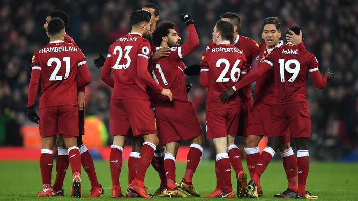 LIVERPOOL, ENGLAND - JANUARY 14: Mohamed Salah of Liverpool celebrates with team mates after scoring the fourth Liverpool goal during the Premier League match between Liverpool and Manchester City at Anfield on January 14, 2018 in Liverpool, England.  (Photo by Shaun Botterill/Getty Images)