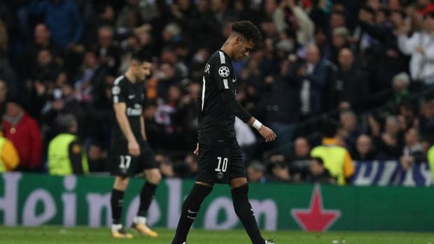 Neymar bakal absen membela PSG melawan Real Madrid pada leg kedua babak 16 besar Liga Champions 2017/2018. (