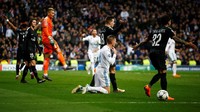 Di penghujung babak pertama, Madrid mendapatkan penalti setelah Toni Kroos dijatuhkan Giovani Lo Celso. (Foto: Stringer/REUTERS)