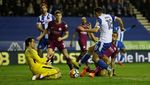 Wigan Musnahkan Peluang Quadruple City