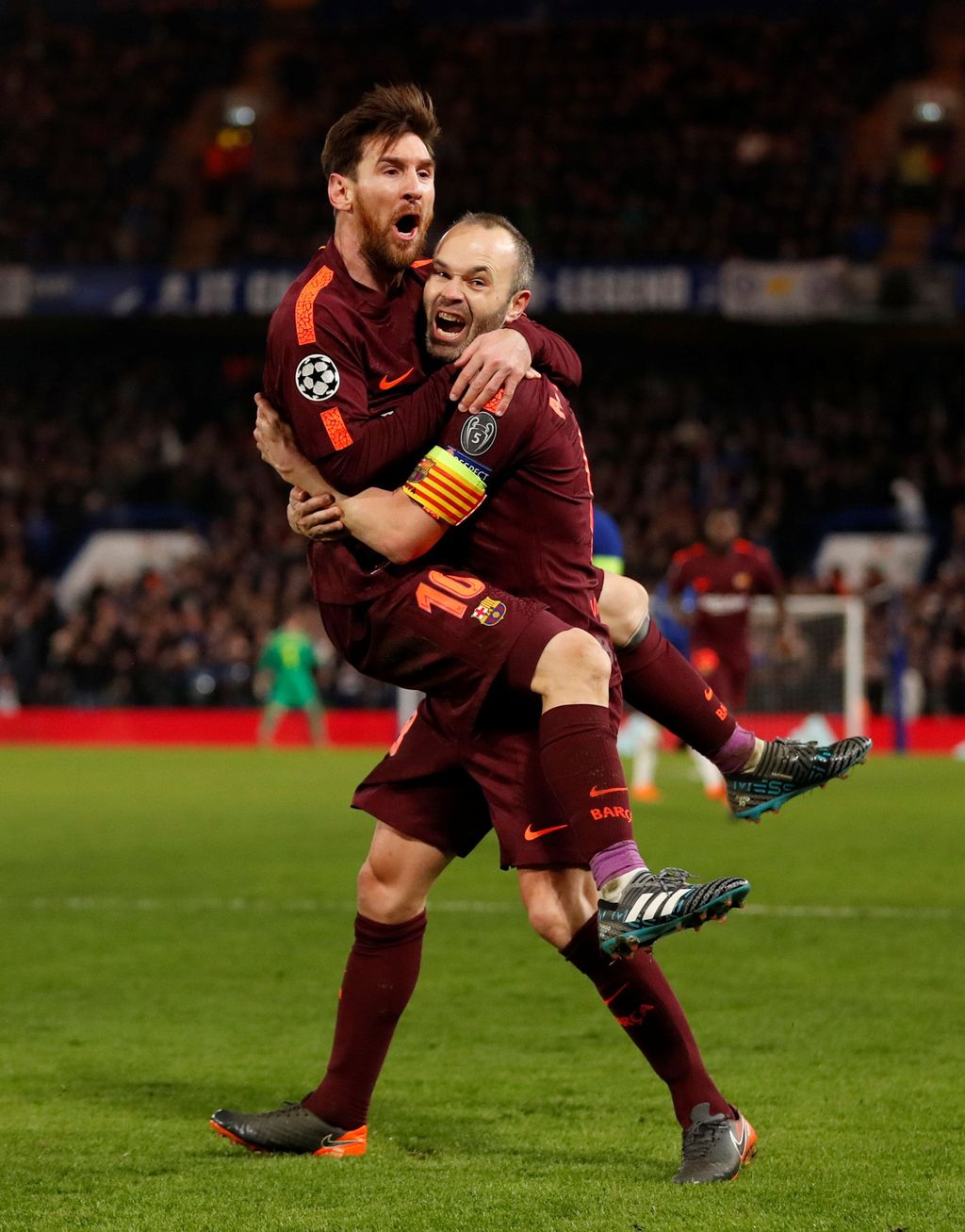 Soccer Football - Champions League Round of 16 First Leg - Chelsea vs FC Barcelona - Stamford Bridge, London, Britain - February 20, 2018   Barcelona's Lionel Messi celebrates scoring their first goal with Andres Iniesta                                Action Images via Reuters/Andrew Boyers