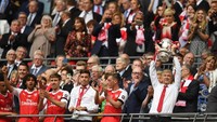 Musim lalu, Arsene Wenger kembali ke final Piala FA dan mengalahkan Chelsea dengan skor 2-1. Ini gelar keempat di ajang ini dari final di Wembley. (Getty Images)
