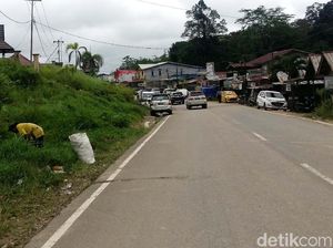 Foto: Jalan Perbatasan Indonesia Vs Malaysia, Mulus Mana? Foto: Jalan Perbatasan Indonesia Vs Malaysia, Mulus Mana?