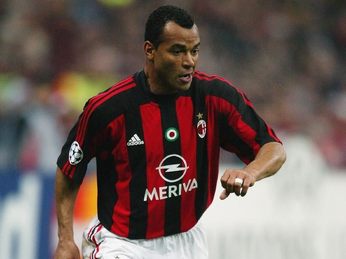 MILAN - MARCH 23:  Cafu of AC Milan runs with the ball during the UEFA Champions League Quarter Final, First Leg match between AC Milan and Deportivo La Coruna held on March 23, 2004 at the Giuseppe Meazza Stadium, in Milan, Italy. AC Milan won the match 4-1. (Photo by Stu Forster/Getty Images)