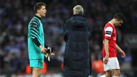 Setelah Wembley selesai dipugar, butuh waktu lama untuk Wenger kembali ke sana. Sayangnya pada laga comeback di 2011, Arsenal kalah 1-2 dari Birmingham City pada final Piala Liga Inggris. (Getty Images)