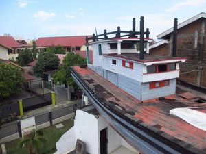 Jejak Kedahsyatan Tsunami Aceh Ada di Atas Rumah Ini Jejak Kedahsyatan Tsunami Aceh Ada di Atas Rumah Ini