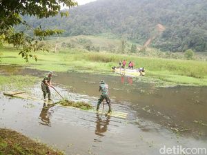 Normalisasi Hulu Ciliwung , TNI-Polri Keruk Telaga Saat di Puncak