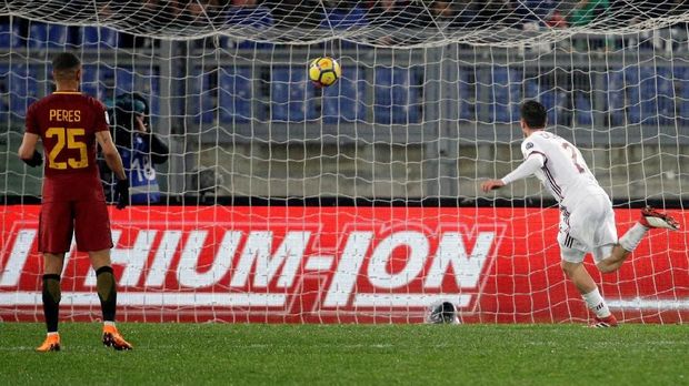 AC Milan berhasil mencuri kemenangan di markas AS Roma.