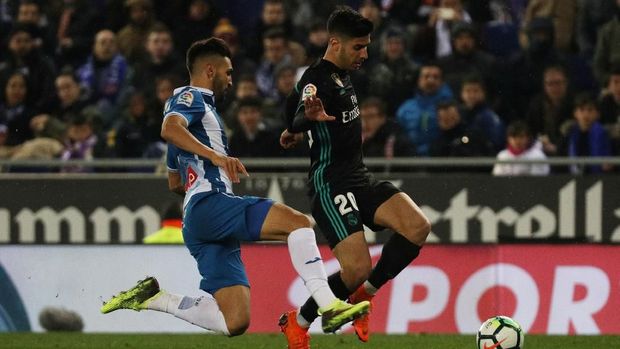 Real Madrid harus berjuang keras membendung serangan-serangan Espanyol. (