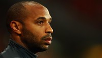 Thierry Henry. Satu lagi ikon Arsenal di masa lalu yang dianggap potensial jadi pengganti Wenger. Sejak 2016, Henry menjadi asisten manajer kedua timnas Belgia setelah merasa kurang dapat dukungan dalam karier melatihnya di akademi Arsenal. (Foto: Dean Mouhtaropoulos/Getty Images)