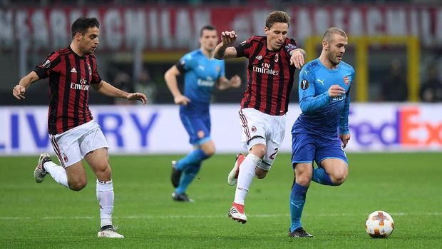 Arsenal memiliki modal di Liga Europa usai menang 2-0 atas AC Milan di leg pertama babak 16 besar.