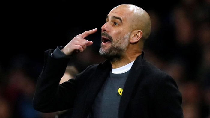 Guardiola Didenda Rp 381 Juta Gara-gara Pita Kuning