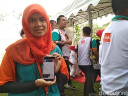 TKI Ini Semringah Bisa Kirim Uang ke Kampung Lewat Ponsel