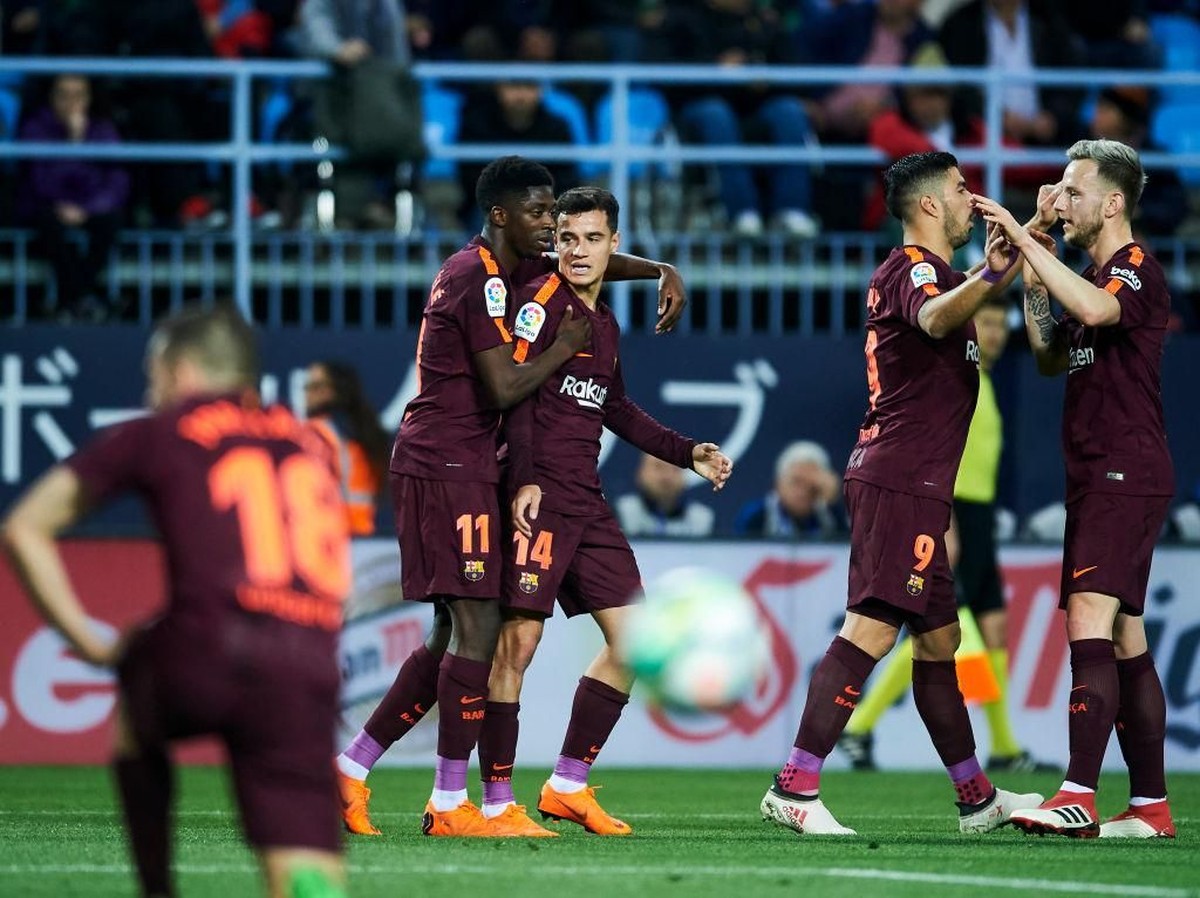 Barcelona merayakan gol ke gawang Malaga. (Foto: Aitor Alcalde/Getty Images)