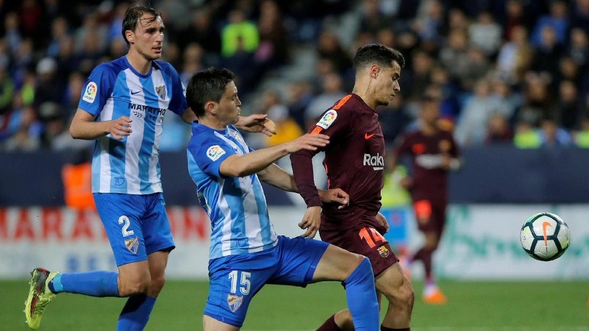 Barcelona menang 2-0 atas Malaga berkat gol Luis Suarez dan Philippe Coutinho (Foto: Jon Nazca/Reuters)