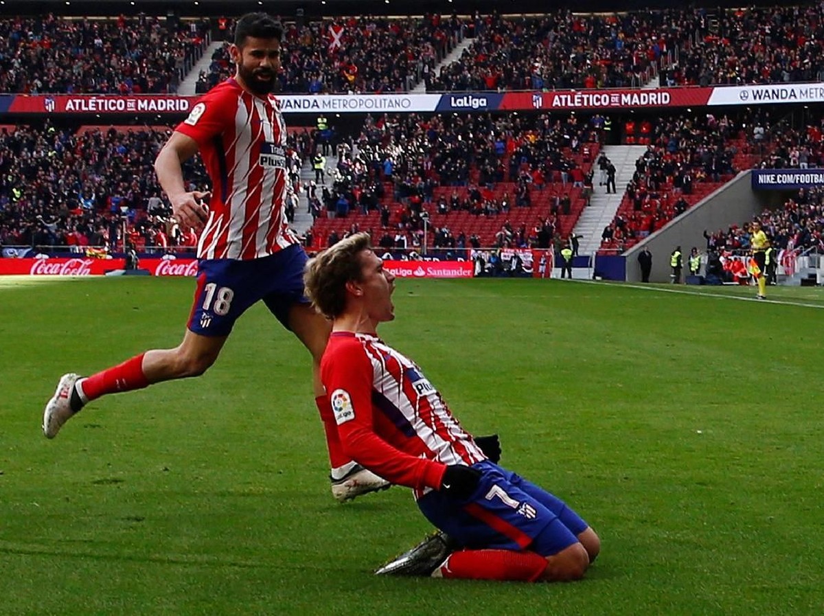 Antoine Griezmann merayakan gol ke gawang Celta Vigo bersama Diego Costa (Foto: Javier Barbancho/REUTERS)