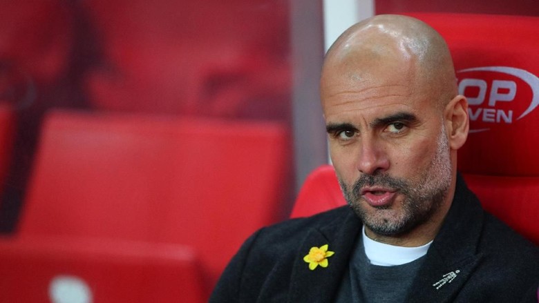 Soal Pita Kuning, Guardiola Kena Denda karena Dinilai Membangkang Soal Pita Kuning, Guardiola Kena Denda karena Dinilai Membangkang