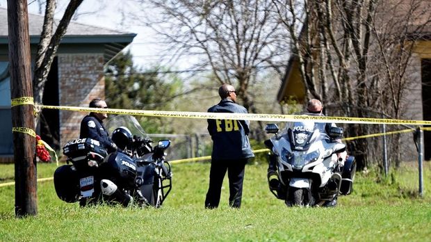 Polisi dan FBI menjaga lokasi serangan