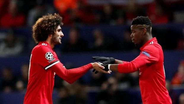 Marouane Fellaini dan Paul Pogba menjadi rekan satu tim di Manchester United.