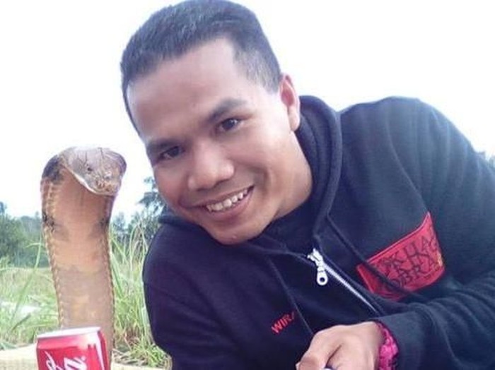 Hussin meninggal setelah digigit oleh ular kobra yang berbisa. (Foto: BBC) Hussin meninggal setelah digigit oleh ular kobra yang berbisa. (Foto: BBC)