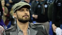 Olivier Giroud. Berasal dari negeri mode, Prancis, Giroud sangat melek fesyen. Penyerang Chelsea berusia 31 tahun itu pun sangat selektif dengan apa yang membalut tubuhnya. (Foto: GLYN KIRK/AFP Photo)