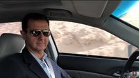 Foto: Nyetir Sendiri, Assad Menyusuri Jalanan Ghouta Timur