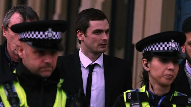 BRADFORD, ENGLAND - MARCH 01:  Footballer Adam Johnson (C) leaves Bradford Crown Court during day thirteen of the trial where he is facing child sexual assault charges on March 1, 2016 in Bradford, England. The former Sunderland FC midfielder, 28, from Castle Eden, County Durham, has admitted one charge of sexual activity with a child and one charge of child grooming, but denies two further counts of sexual activity with a child.  (Photo by Nigel Roddis/Getty Images)