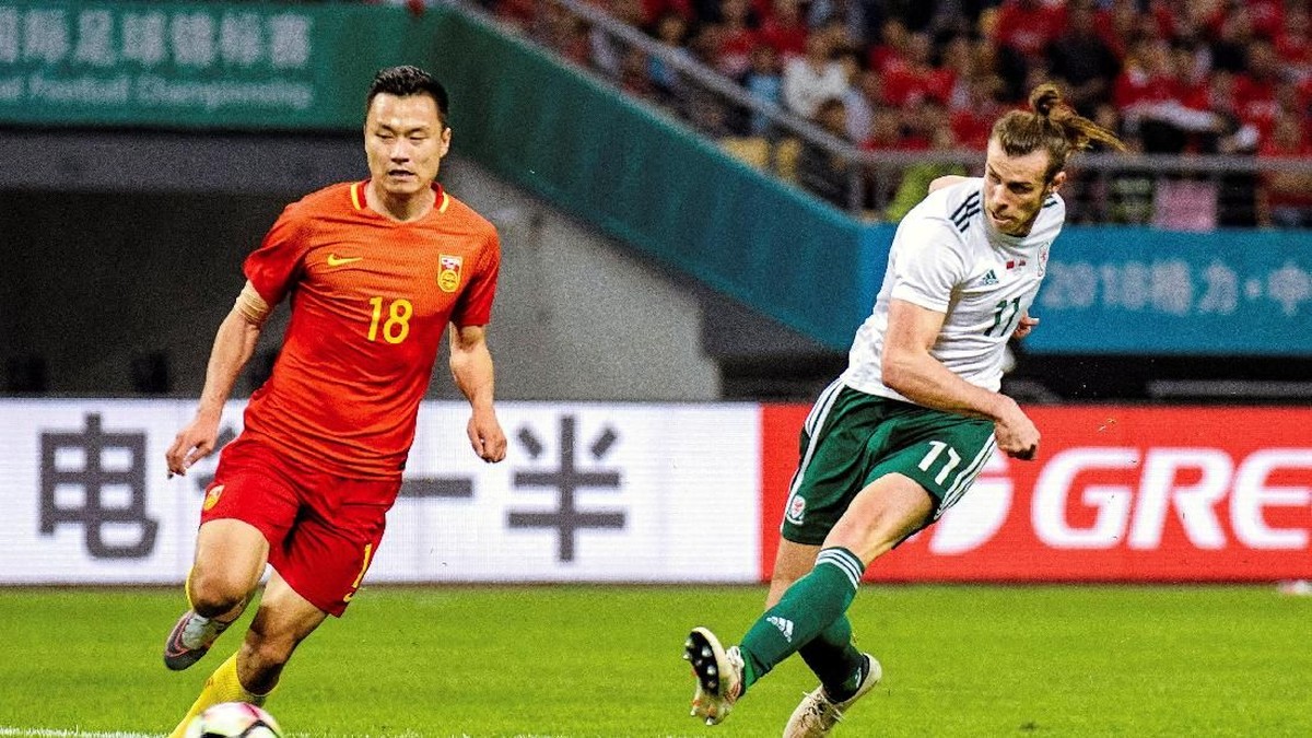 Wales menang 6-0 atas China di debut Ryan Giggs (Stringer/Reuters)