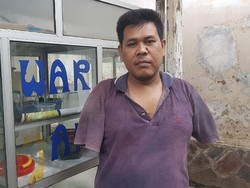 Heri, Tak Punya Lengan Tetap Semangat Berjualan Makanan