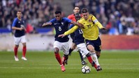 Kolombia mulai bangkit setelah kebobolan dua gol sebelum laga berjalan setengah jam. James Rodriguez (kanan) memberi dua assist untuk gol-gol Kolombia. Foto: Aurelien Meunier/Getty Images