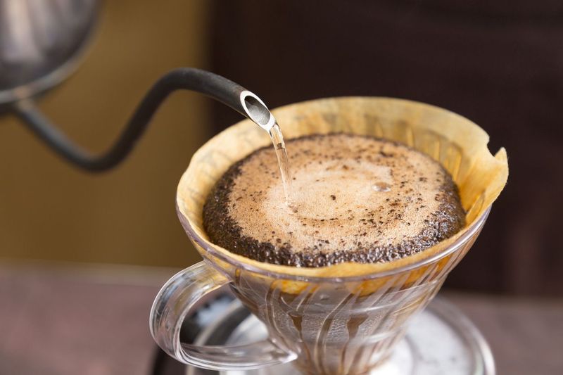 Coffee made in a cafetiere and cup in a domestic kitchen
