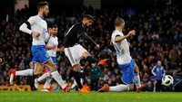 Argentina baru bisa memecahkan kebuntuan melalui gol Ever Banega pada menit ke-75.  Foto: Phil Noble/Reuters