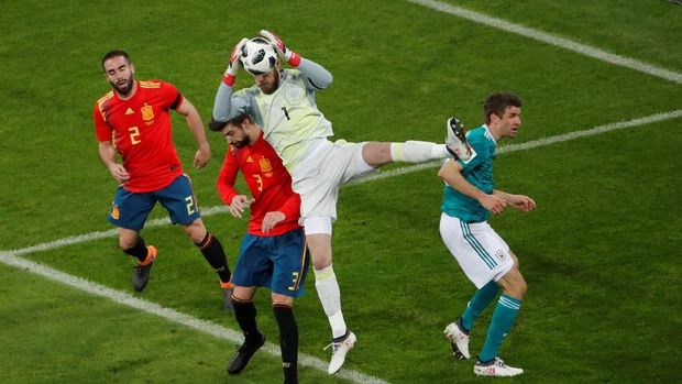 Timnas Jerman dan Spanyol bermain imbang dalam laga uji tanding, Jumat (23/3).